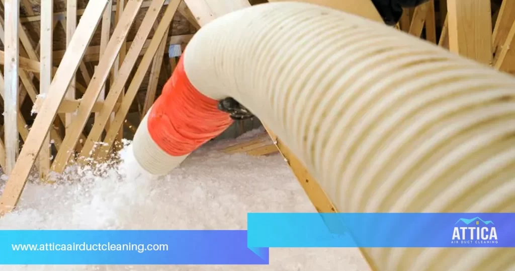 An image of an attic that's currently getting attic insulation installed by Attica's team of experts.