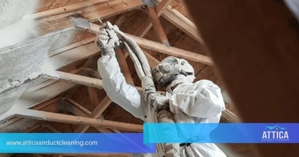 Shows an image of Attica's technician providing atiic insulation removal services.